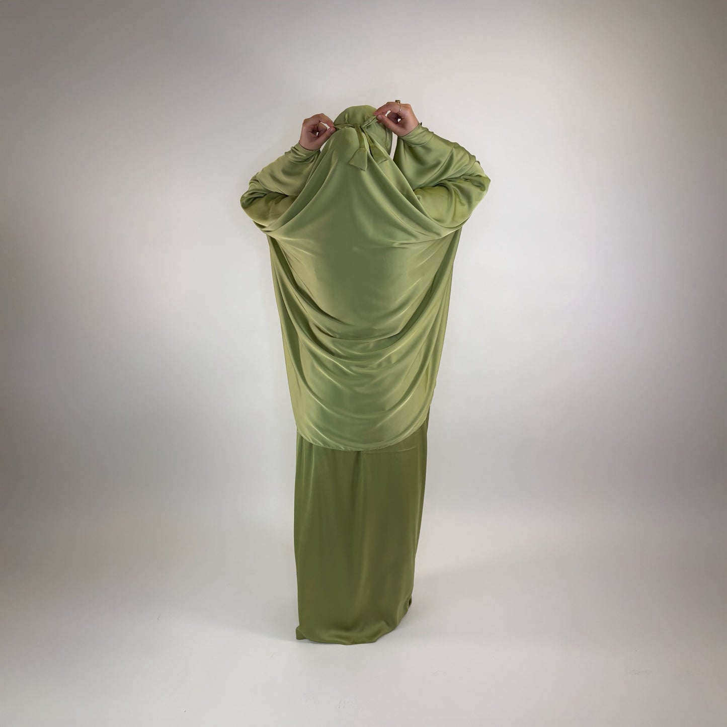 Two-piece satin prayer set designed for comfort and modesty