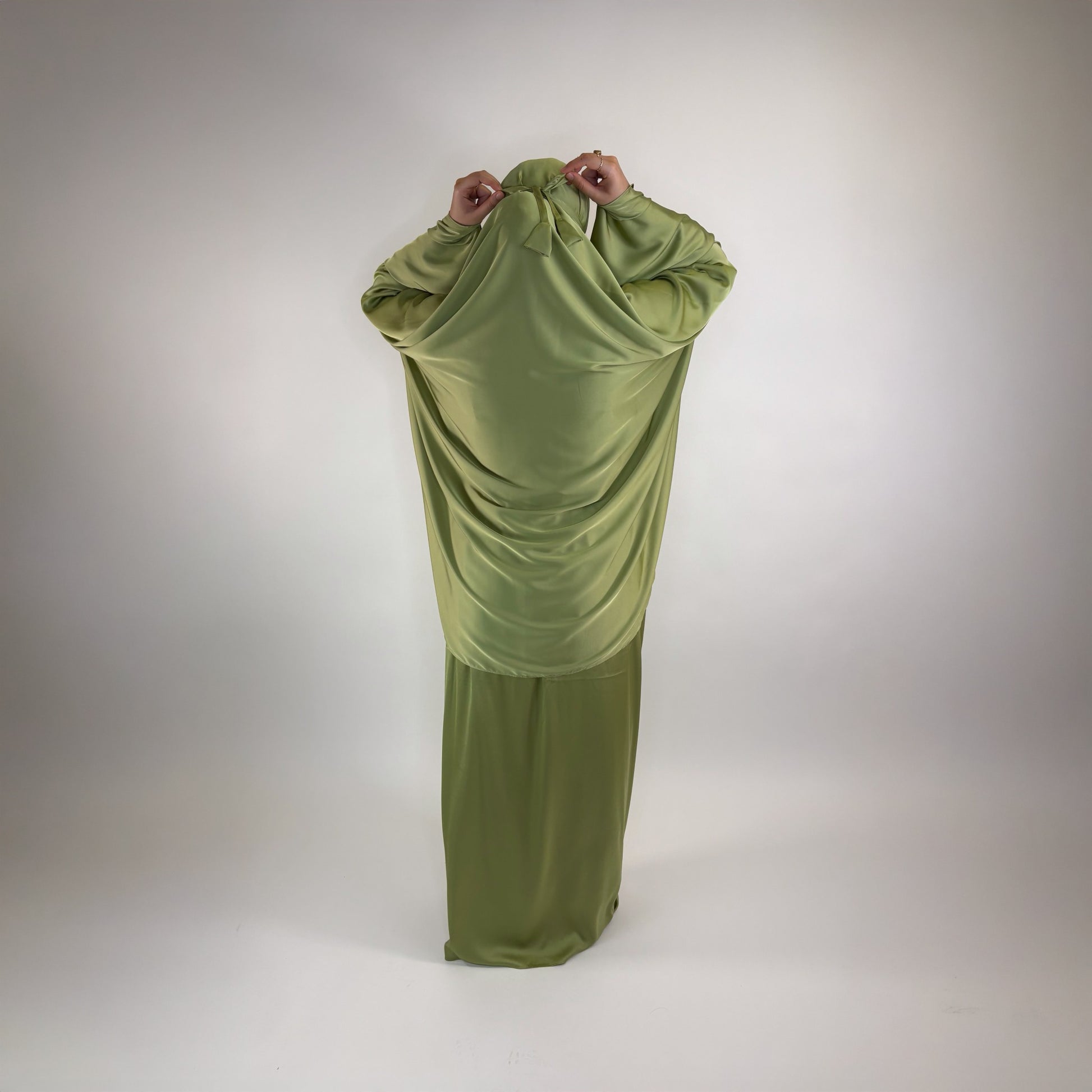 Two-piece satin prayer set designed for comfort and modesty